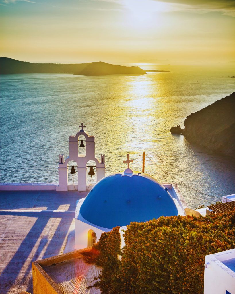 santorini solo travel blue dome church sunset wandersister
