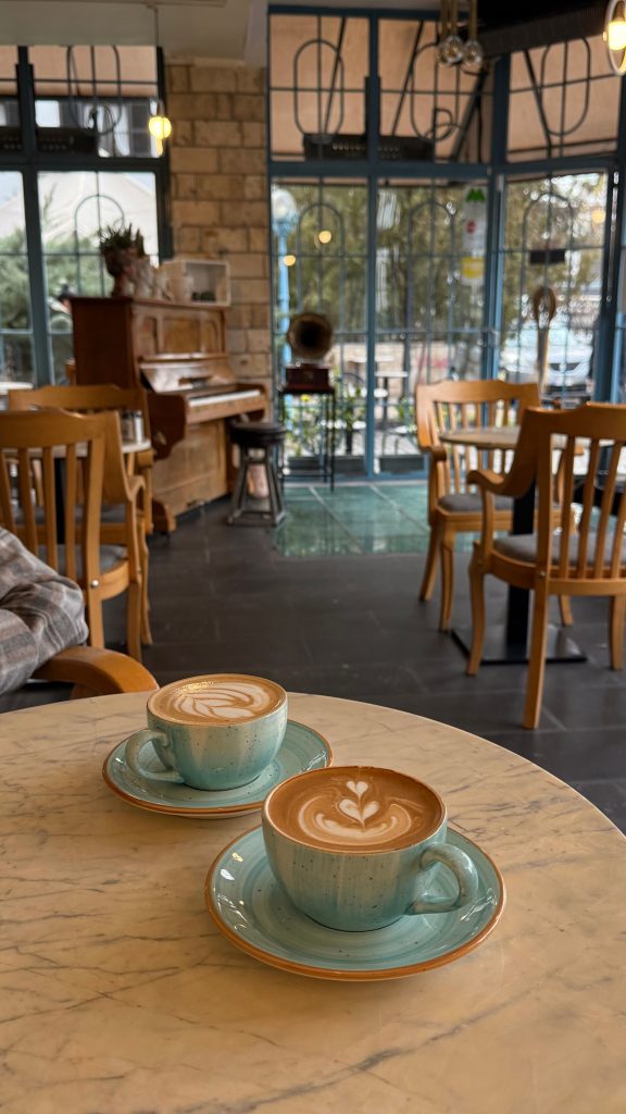 two coffee cups cafe travel companion vetting wandersister