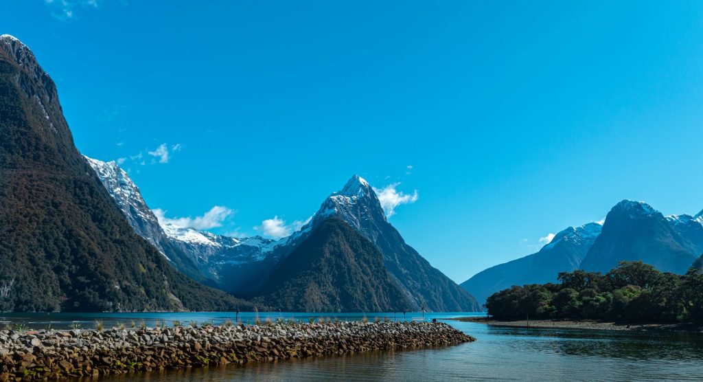 new zealand solo female travel over 50 milford sound reflection