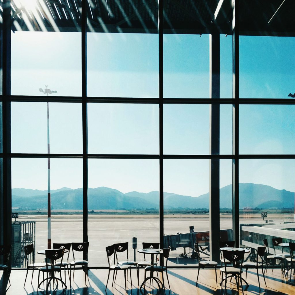 what to do if something goes wrong empty airport terminal cafe window view
