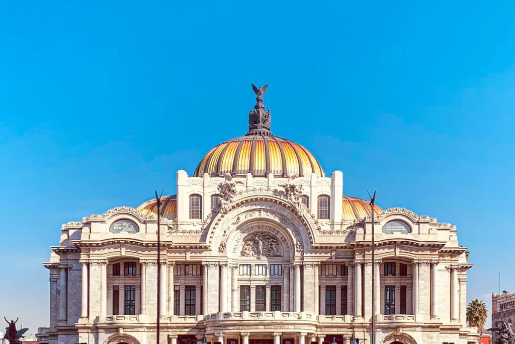 The golden dome of the Palacio de Bellas Artes in Mexico City, illustrating safe and elegant solo travel in Mexico for women over 50.