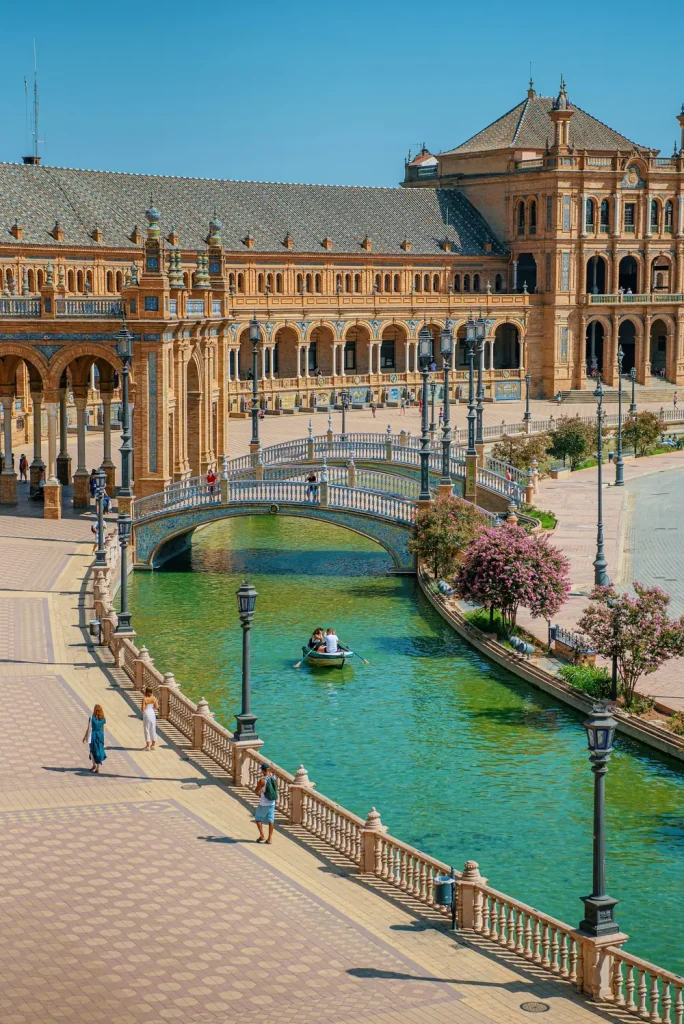The tiled arcades of the Plaza de España in Seville, illustrating safe and elegant Seville solo travel for women over 50.